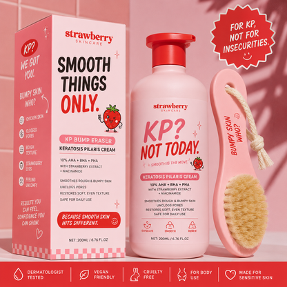 Strawberry skincare product with packaging and brush on a pink background